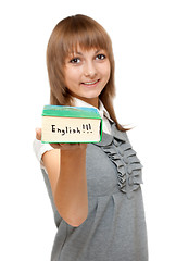 Image showing Young girl with dictionary english