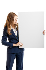 Image showing Business Woman holding a billboard