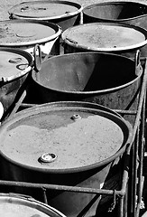 Image showing Old rusty waste barrels