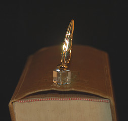 Image showing featherpen on a lawbook