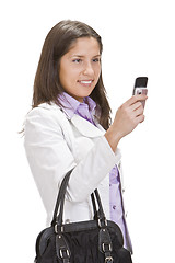 Image showing Checking the mobile phone