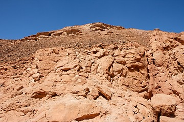 Image showing Red rocky hill in the desert landscape