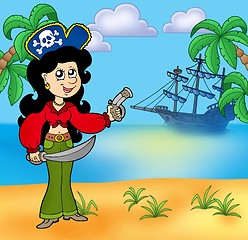 Image showing Pirate girl on beach 1