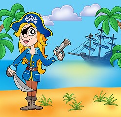 Image showing Pirate girl on beach 3