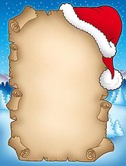 Image showing Winter parchment with Santas hat