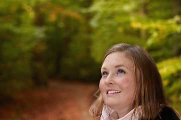 Image showing Fall - cute woman looking at copyspace