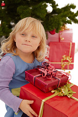 Image showing Christmas - Little girl with lots of presents