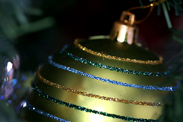 Image showing Christmas ornaments on tree.