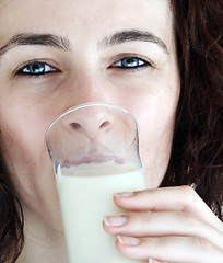 Image showing Young people eating milk.