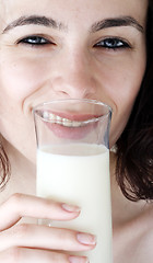 Image showing Young people eating milk.