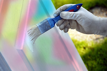 Image showing Painting wooden door