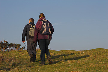 Image showing A couple hiking across the countryside