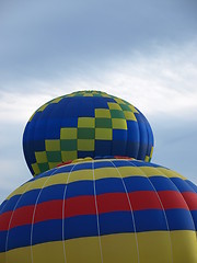 Image showing Two  balloons lifting off
