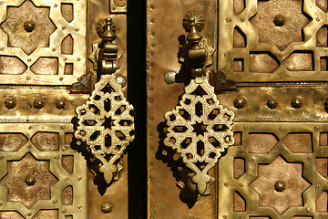 Image showing Brass gate with doorknockers. Marrakech, Morocco