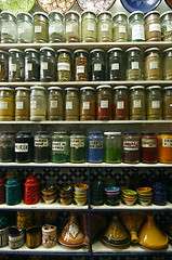 Image showing Jars of herbs and powders in a moroccan spice shop.