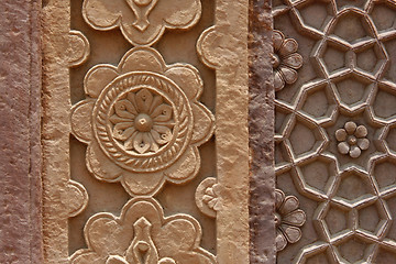 Image showing Stone carvings on the wall of a temple in India