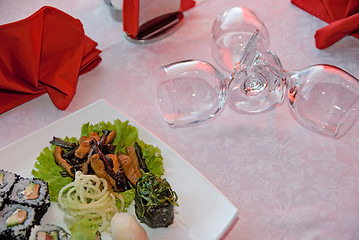 Image showing sushi set plate and vine glass 