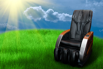 Image showing massage arm-chair on the grass field