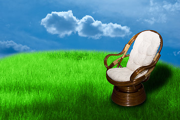 Image showing Rocking chair on green grass 