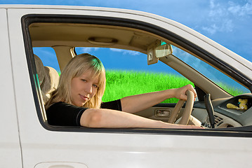 Image showing young woman driving
