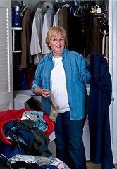 Image showing Mature Woman doing laundry