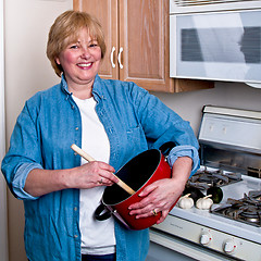 Image showing MAture Woman in Kitchen