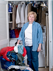 Image showing Mature Woman Doing Laundry