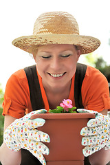 Image showing Young woman - gardening
