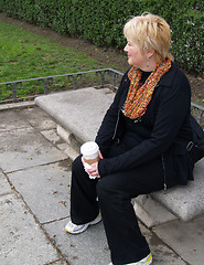 Image showing Mature Woman on park bench