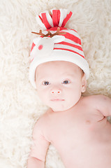 Image showing Newborn baby in chritstmas hat