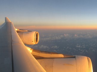 Image showing Airplane wing under sunset