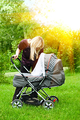 Image showing mother with baby carriage