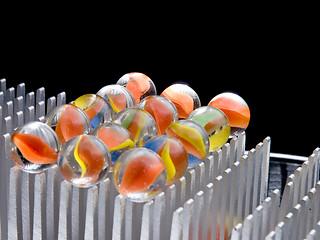 Image showing Colored Marbles on grid