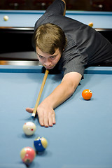 Image showing caucasian man playing pool
