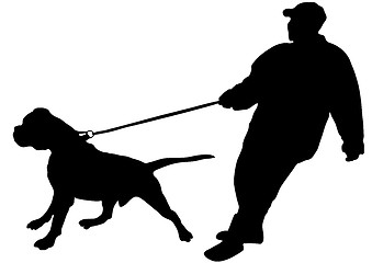 Image showing The man just keeps his large dog on a leash