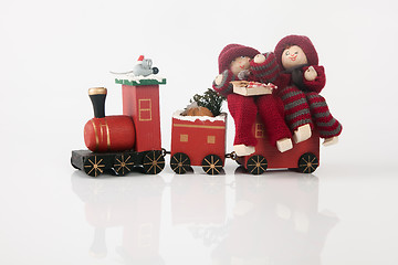 Image showing Elfs on a toy train