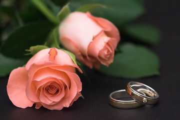 Image showing Roses and rings