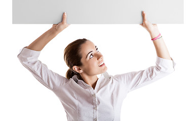 Image showing Woman holding a billboard