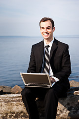 Image showing Caucasian businessman with laptop