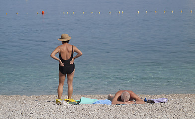 Image showing Retired couple by the sea