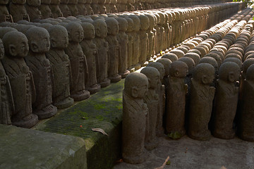 Image showing Stone monks statues