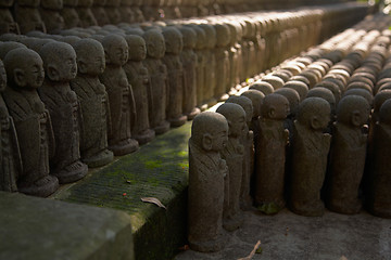 Image showing Stone monks statues