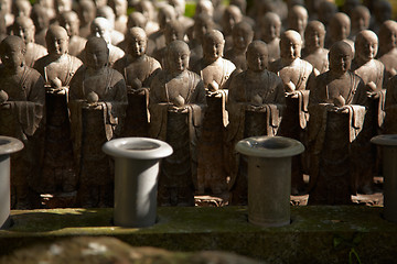 Image showing Stone monks statues