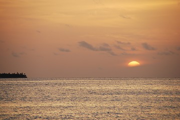 Image showing Beautiful orange sunset on a tropical beach