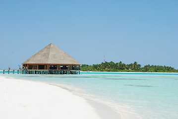 Image showing Bungalow's architecture and beach on a Maldivian Island