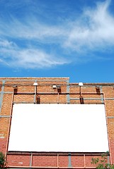 Image showing Blank billboard on a brick building