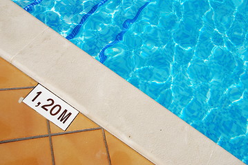 Image showing Pool depth sign at the edge of the swimming pool