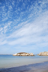 Image showing Huge rock at Baleal beach (dramatic cloudscape)