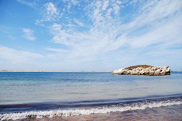 Image showing Huge rock at Baleal beach (dramatic cloudscape)