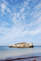 Image showing Huge rock at Baleal beach (dramatic cloudscape)